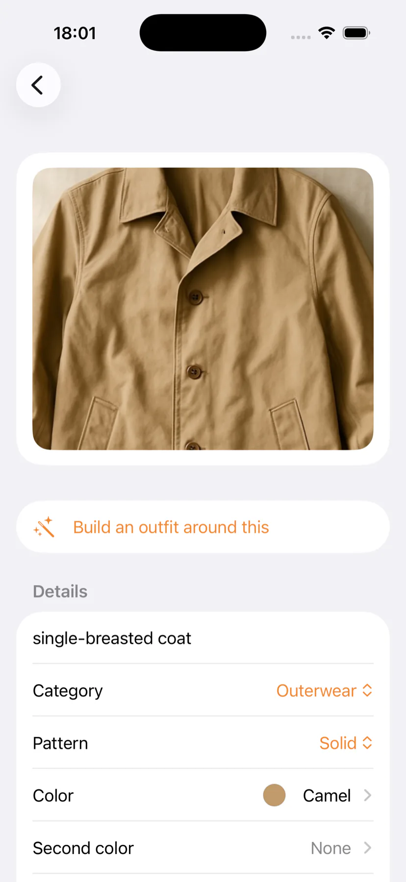An item detail screen in Armovia: a trench coat with its category, colour and pattern, and a Build an outfit button.